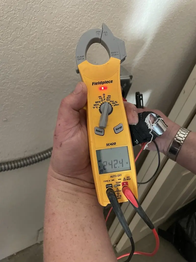 Voltage testing with clamp meter during Electrical Installation Services in Clearlake Riviera